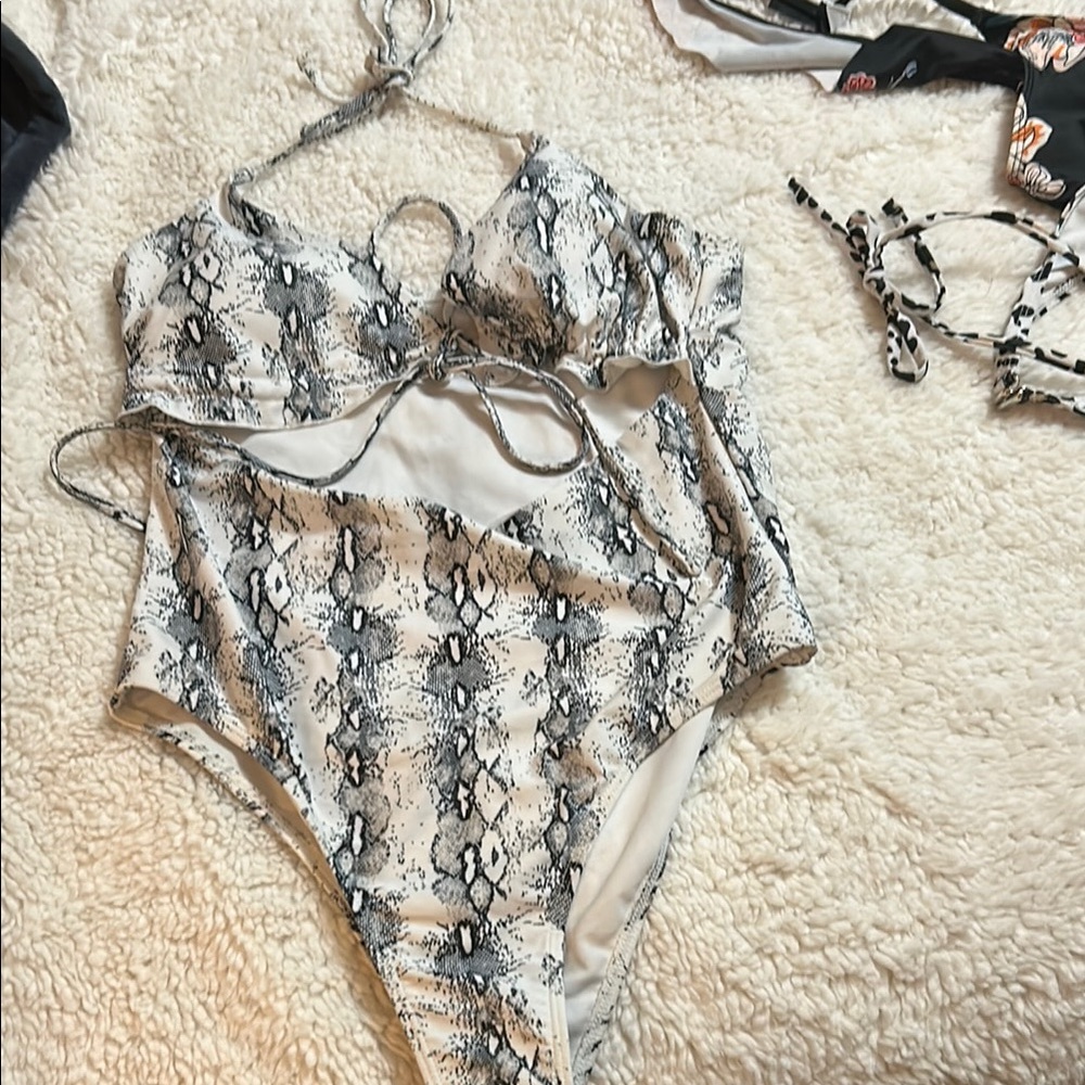 One piece swimsuit.